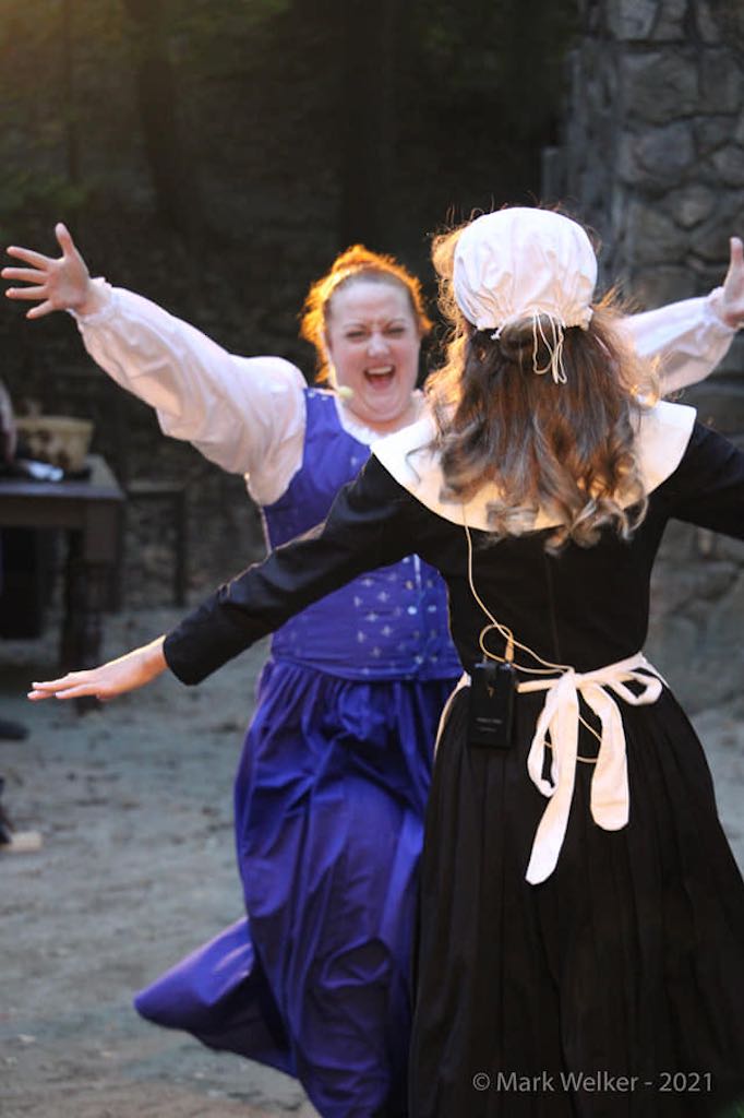 A happy moment between Bea and Portia at curtain call